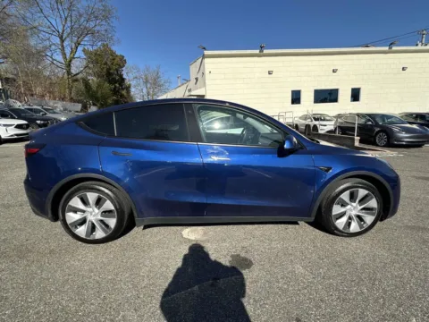 Photos of 2022 Tesla Model Y Long Range for sale in Great Neck, NY at Certified Luxury Motors - Great Neck