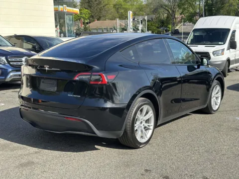 Another view of 2022 Tesla Model Y Long Range for sale in Great Neck, NY at Certified Luxury Motors - Great Neck