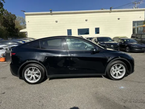 Photos of 2022 Tesla Model Y Long Range for sale in Great Neck, NY at Certified Luxury Motors - Great Neck