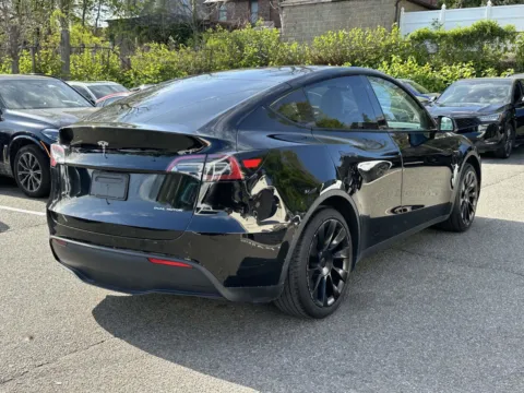 Another view of 2023 Tesla Model Y Long Range for sale in Great Neck, NY at Certified Luxury Motors - Great Neck