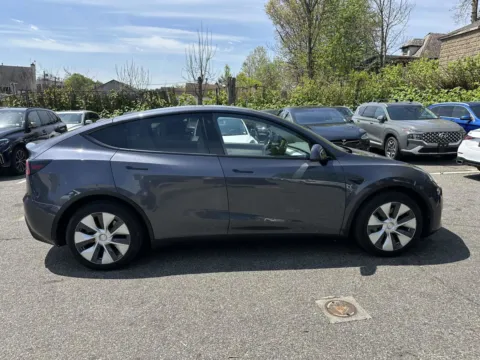 Photos of 2022 Tesla Model Y Long Range for sale in Great Neck, NY at Certified Luxury Motors - Great Neck