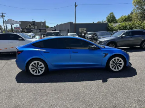 Photos of 2021 Tesla Model 3 Standard Range Plus for sale in Great Neck, NY at Certified Luxury Motors - Great Neck
