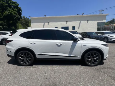 Another view of 2022 Acura MDX w/A-Spec Package (Red Interior) for sale in Great Neck, NY at Certified Luxury Motors - Great Neck