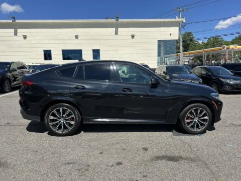 Another view of 2022 BMW X6 xDrive40i M-Sport (Red Interior) for sale in Great Neck, NY at Certified Luxury Motors - Great Neck