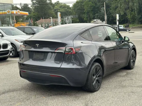 Another view of 2024 Tesla Model Y Long Range for sale in Great Neck, NY at Certified Luxury Motors - Great Neck
