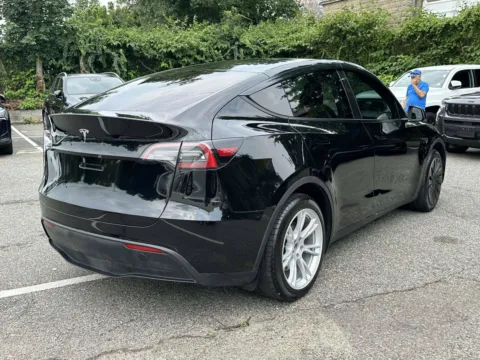 Another view of 2023 Tesla Model Y Long Range for sale in Great Neck, NY at Certified Luxury Motors - Great Neck