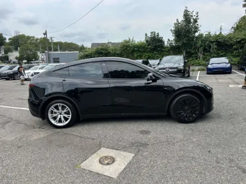 Photos of 2023 Tesla Model Y Long Range for sale in Great Neck, NY at Certified Luxury Motors - Great Neck