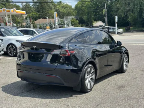 Another view of 2024 Tesla Model Y Long Range for sale in Great Neck, NY at Certified Luxury Motors - Great Neck