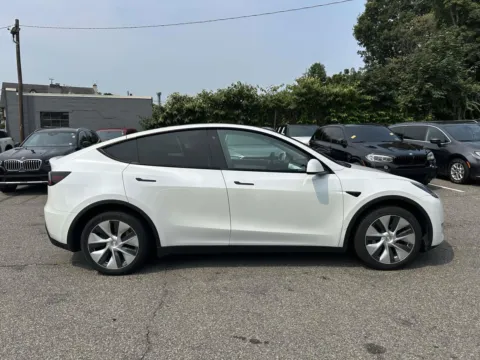 Photos of 2020 Tesla Model Y Long Range (White Interior) for sale in Great Neck, NY at Certified Luxury Motors - Great Neck