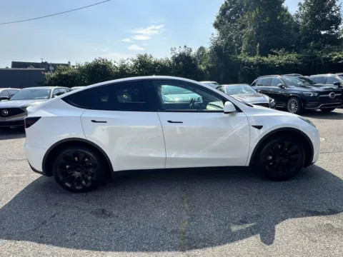 Photos of 2021 Tesla Model Y Long Range for sale in Great Neck, NY at Certified Luxury Motors - Great Neck