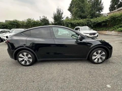 Photos of 2021 Tesla Model Y Long Range for sale in Great Neck, NY at Certified Luxury Motors - Great Neck