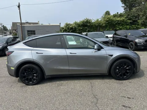 Photos of 2024 Tesla Model Y Long Range for sale in Great Neck, NY at Certified Luxury Motors - Great Neck