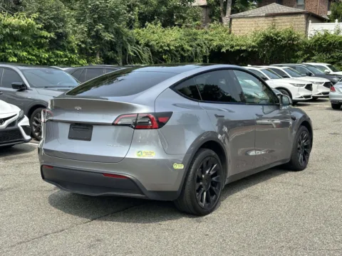 Another view of 2024 Tesla Model Y Long Range for sale in Great Neck, NY at Certified Luxury Motors - Great Neck