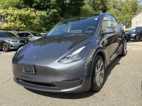 Another view of 2023 Tesla Model Y Long Range for sale in Great Neck, NY at Certified Luxury Motors - Great Neck