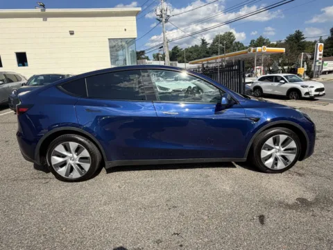 Photos of 2023 Tesla Model Y for sale in Great Neck, NY at Certified Luxury Motors - Great Neck