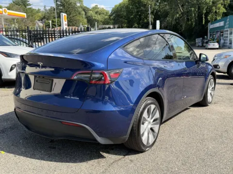 Another view of 2023 Tesla Model Y for sale in Great Neck, NY at Certified Luxury Motors - Great Neck
