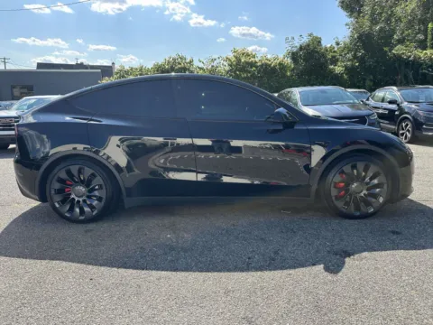 Photos of 2022 Tesla Model Y Performance (White Interior) for sale in Great Neck, NY at Certified Luxury Motors - Great Neck