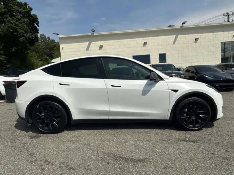 Photos of 2021 Tesla Model Y Long Range (White Interior) for sale in Great Neck, NY at Certified Luxury Motors - Great Neck