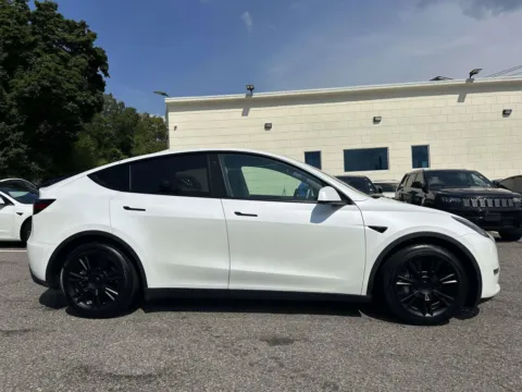 Photos of 2021 Tesla Model Y Long Range for sale in Great Neck, NY at Certified Luxury Motors - Great Neck