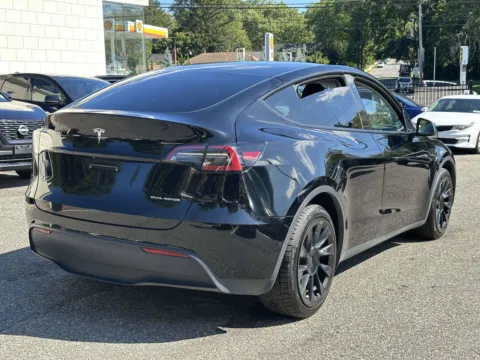 Another view of 2022 Tesla Model Y Long Range for sale in Great Neck, NY at Certified Luxury Motors - Great Neck