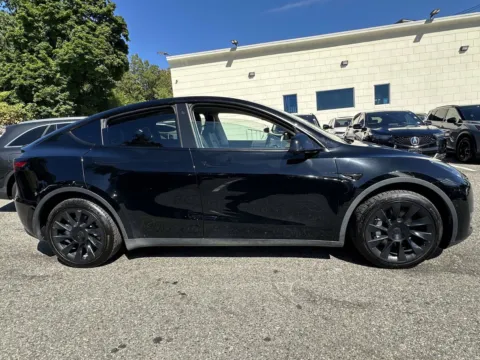 Photos of 2022 Tesla Model Y Long Range for sale in Great Neck, NY at Certified Luxury Motors - Great Neck
