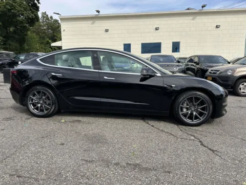 Photos of 2020 Tesla Model 3 Standard Range for sale in Great Neck, NY at Certified Luxury Motors - Great Neck