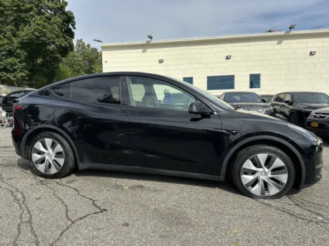 Photos of 2023 Tesla Model Y Long Range for sale in Great Neck, NY at Certified Luxury Motors - Great Neck