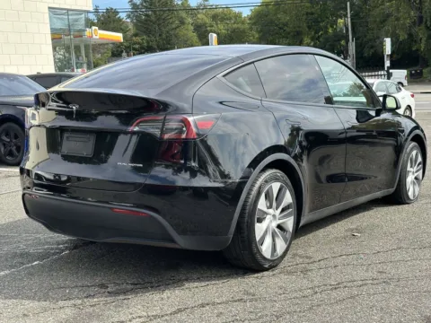 Another view of 2023 Tesla Model Y Long Range for sale in Great Neck, NY at Certified Luxury Motors - Great Neck