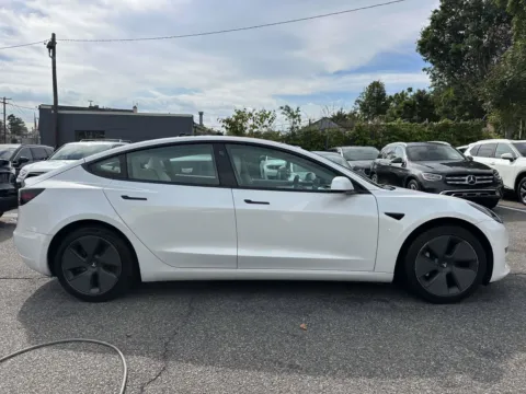 Photos of 2021 Tesla Model 3 Standard Range Plus for sale in Great Neck, NY at Certified Luxury Motors - Great Neck