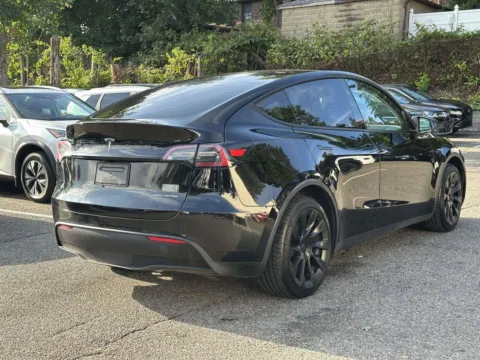 Another view of 2023 Tesla Model Y Long Range for sale in Great Neck, NY at Certified Luxury Motors - Great Neck