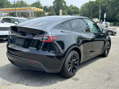 Photos of 2021 Tesla Model Y Long Range for sale in Great Neck, NY at Certified Luxury Motors - Great Neck
