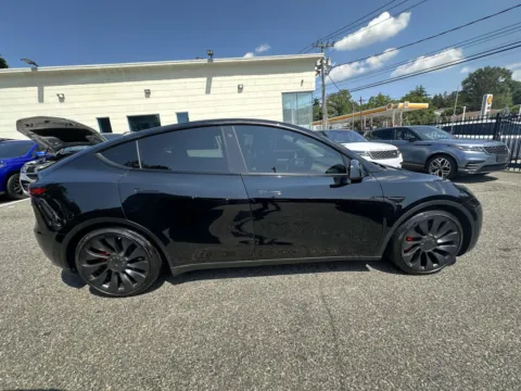 Photos of 2022 Tesla Model Y Performance for sale in Great Neck, NY at Certified Luxury Motors - Great Neck