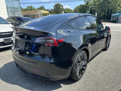 Another view of 2022 Tesla Model Y Performance for sale in Great Neck, NY at Certified Luxury Motors - Great Neck