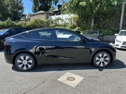 Photos of 2021 Tesla Model Y Long Range for sale in Great Neck, NY at Certified Luxury Motors - Great Neck