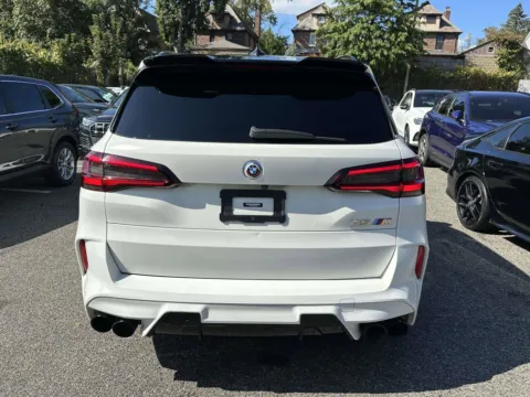 Another view of 2022 BMW X5 M (Matte White /Red Interior) for sale in Great Neck, NY at Certified Luxury Motors - Great Neck