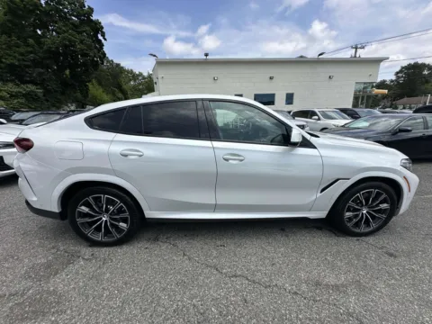 Another view of 2022 BMW X6 xDrive40i M-Sport for sale in Great Neck, NY at Certified Luxury Motors - Great Neck