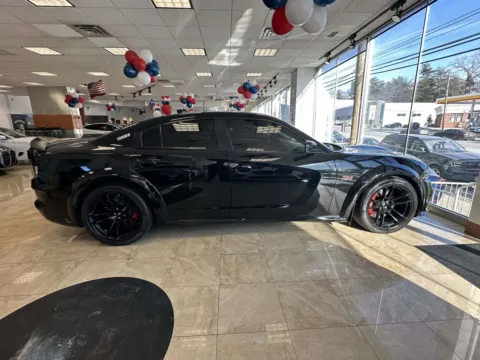 Another view of 2020 Dodge Charger Scat Pack Widebody (Red Interior/12k Miles!) for sale in Great Neck, NY at Certified Luxury Motors - Great Neck