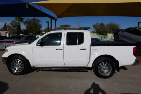Photos of 2012 Nissan Frontier Crew Cab SL Pickup 4D 5 ft for sale in El Paso, TX at Torresdey Motors Alameda