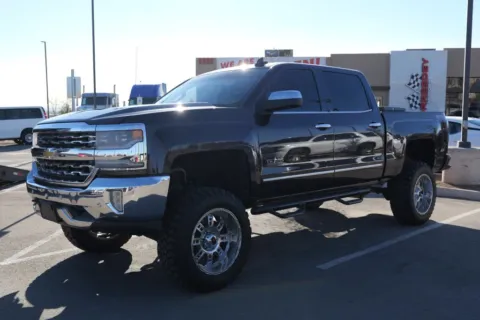 Silver 2016 Chevrolet Silverado 1500 Crew Cab LTZ Pickup 4D 5 3/4 ft for sale in El Paso, TX