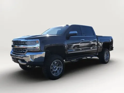 Silver 2016 Chevrolet Silverado 1500 Crew Cab LTZ Pickup 4D 5 3/4 ft for sale in El Paso, TX