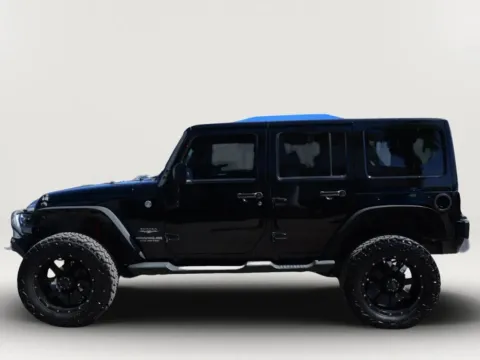 Photos of 2013 Jeep Wrangler Unlimited Sahara Sport Utility 4D for sale in El Paso, TX at Torresdey Motors Alameda