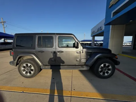 Gray 2022 Jeep Wrangler Unlimited Sahara for sale in Levelland, TX