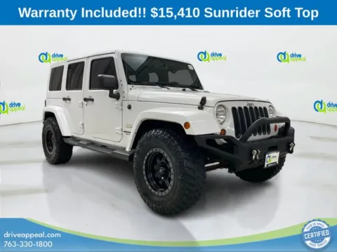 Another view of 2013 Jeep Wrangler Unlimited Sahara for sale in Bloomington, MN at Drive Appeal Bloomington