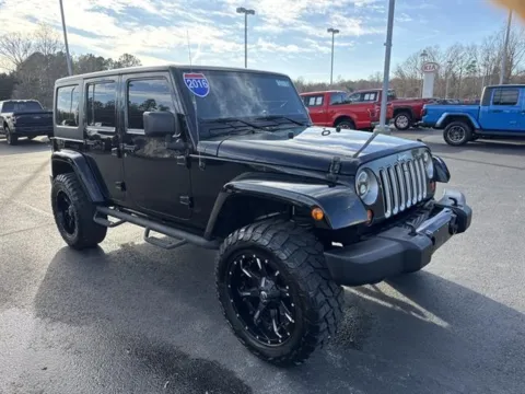 Black 2016 Jeep Wrangler Unlimited Sahara for sale in Danville, VA