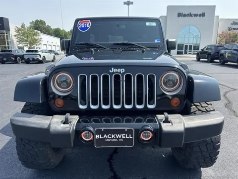 Photos of 2016 JEEP WRANGLER UNLIMI 4x4 Sahara 4dr SUV for sale in Danville, VA at Blackwell Kia