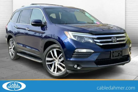 Red 2016 Honda Pilot Elite for sale in Kansas City, MO