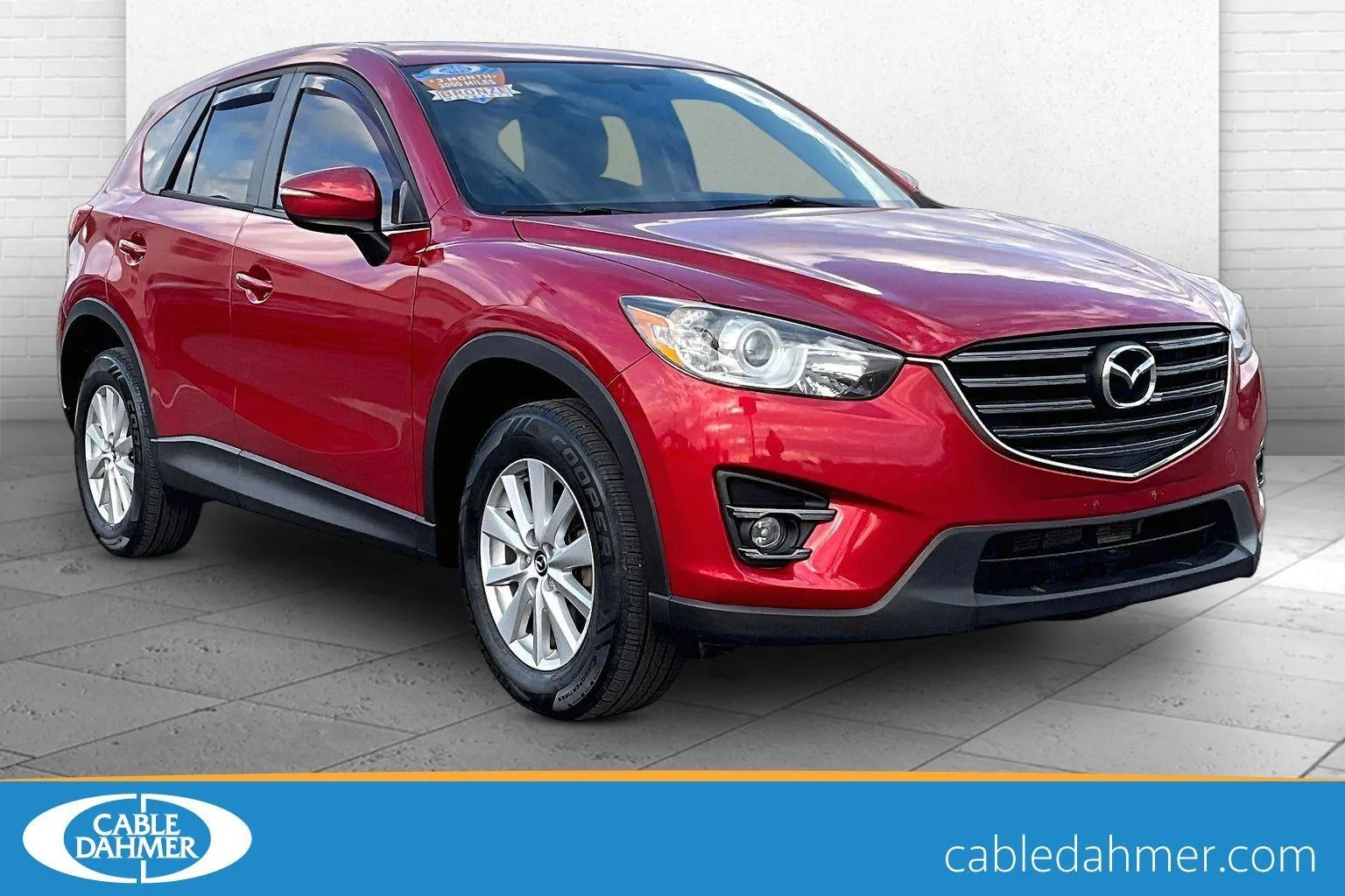 Used 2016 Mazda CX-5 Touring with VIN JM3KE4CY8G0856456 for sale in Kansas City