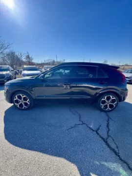Photos of 2023 Kia Niro EX Touring for sale in Lee's Summit, MO at Cable Dahmer Kia of Lee's Summit