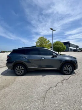 Photos of 2024 Kia Sportage Hybrid SX-Prestige for sale in Lee's Summit, MO at Cable Dahmer Kia of Lee's Summit