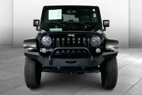 Photos of 2016 Jeep Wrangler Unlimited Sahara for sale in Lee's Summit, MO at Cable Dahmer Kia of Lee's Summit